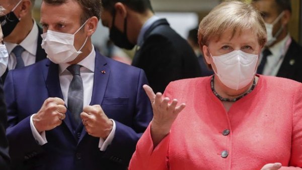 НЕ ОПУШТАЈТЕ СЕ: Меркел и Макрон позивају на опрез поводом короне