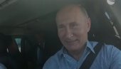 ŠTA, I JA MORAM DA SE VEŽEM? Putin sa osmehom na licu provozao Aurusa po Krimu (VIDEO)