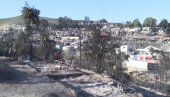 DO TEMELJA IZGOREO MIGRANTSKI CENTAR: Na pomolu haos u Grčkoj, 13.000 migranata napušta kamp - požar podmetnut? (VIDEO)