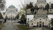 SAOBRAĆAJ OKO HRAMA SVETOG SAVE OBUSTAVLJEN: Na ulasku u hram stoje pripadnici garde Vojske Srbije, a vernici pale sveće