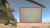 ОПАСНИ СУДАР АПАЧА И РУСКОГ ХЕЛИКОПТЕРА! Невероватна слика са сиријског неба, Ми-35 држи Амере на нишану (ФОТО)