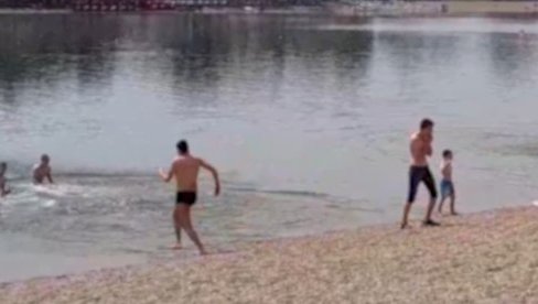 PRVOMAJSKO KUPANJE NA ADI CIGANLIJI: Izletnici slave praznik rada i brčkaju se u beogradskom moru (FOTO/VIDEO)