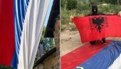АЛБАНЦИ ОСКРНАВИЛИ ТРОБОЈКУ: Украдена застава са врата Грачанице, објављене срамне фотографије