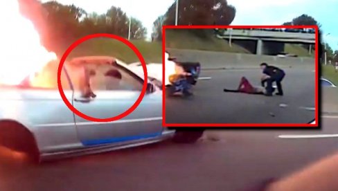 SCENA OD KOJE ZASTAJE DAH: Policajac iz automobila-buktinje izvukao čoveka bez svesti, postao heroj nacije (VIDEO)