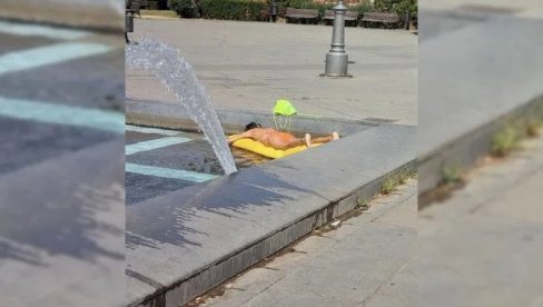 PONOVO NEVERICA U CENTRU BEOGRADA: Žena se skinula, pa se opustila u fontani ispred Hrama (FOTO)