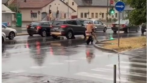 HIT SNIMAK IZ NOVOG SADA: Usred nevremena vozač se na skuteru provozao u kupaćim gaćama (VIDEO)