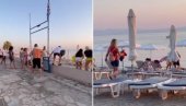LETOVANJE U GRČKOJ SE PRETVORILO U SRPSKU BORBU: Pogledajte bitku na plaži za ležaljke - žena pala na glavu (VIDEO)