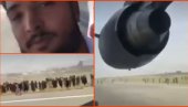 НОВИ ЈЕЗИВИ СНИМАК ИЗ АВГАНИСТАНА! Закачио се за амерички авион, страшан видео запис открива очај цивила (ВИДЕО)