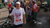 NA TRKU IDE BICIKLOM: Trči u majici s likovima srpskih olimpijaca