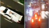 НЕВЕРОВАТНИ СНИМЦИ СА УЛИЦА БРАЗИЛА: Пљачкаши банке везали људе на возило којим су бежали - Користили таоце као живи штит (ВИДЕО)