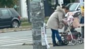 JEZIV SNIMAK IZ NOVOG SADA: Žena šamara bebu u kolicima nasred ulice (VIDEO)