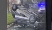 SAOBRAĆAJNA NESREĆA U MIRIJEVU: Automobil se prevrnuo na krov i preprečio ulicu
