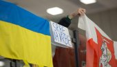 SRAMNA PORUKA SRPSKIM HOKEJAŠIMA U POLJSKOJ: Srbe na vrbe pored ukrajinske zastave nad klupom našeg tima (FOTO)