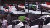 ZA RUBRIKU VEROVALI, ILI NE Pažljivo pogledajte snimak: Auto je smrskan između kamiona i mešalice, a vozač - nepovređen! (VIDEO)