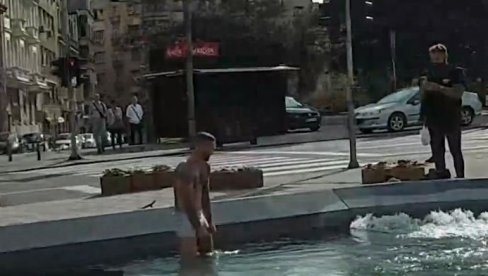 ПРВОМАЈСКО КУПАЊЕ У ФОНТАНИ: Несвакидашња сцена у Београду, мушкарац ускочио у воду на Тргу Николе Пашића (ФОТО)