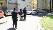 ПОЛИЦИЈА И ПСИ У КБЦ ДРАГИША МИШОВИЋ: Екипе обављају прегледе након дојава о бомбама (ФОТО)