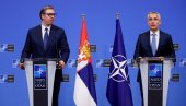 NO FLAG OF A FAKE COUNTRY: Vučić joins NATO in front of the Serbian flag, and Kurti nowhere with the so-called flag.  of Kosovo