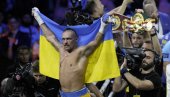 USIK SE PREKRSTIO, PA POLJUBIO ZASTAVU: Trijumf posvetio Ukrajini, pa prozvao Tajsona