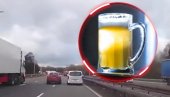 СУЛУДА ЕГЗИБИЦИЈА НА АУТОПУТУ: Возач шокирао ризичним потезом - угрозио безбедност, све због пива (ВИДЕО)