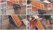 SREĆOM IZBEGNUTA NESREĆA: Kamion išao u rikverc, propao u rupu, kabina vozača završila u vazduhu! (VIDEO)