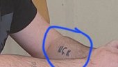 TERORISTIČKI SIMBOLI NA KURTIJEVIM IZBORIMA: Sramna tetovaža tzv. OVK na članu biračkog odbora u Lipi (FOTO)