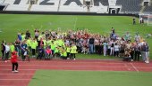 SPORTOM DO OSMEHA ČETVRTI PUT NA STADIONU JNA: Mališani sa invaliditetom uživali sa prvotimcima Partizana