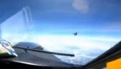 NEPOTREBNO AGRESIVAN MANEVAR: Bliski susret kineskog i američkog izviđačkog aviona (VIDEO)