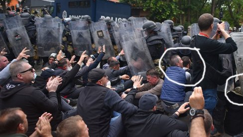 МИРНО СЕДЕЛИ НА ЗЕМЉИ, ПА НЕСТАЛИ ИЗА КОРДОНА КФОР-а: Ево доказа да ухапшени Срби на митингу нису учествовали у нередима (ФОТО/ВИДЕО)