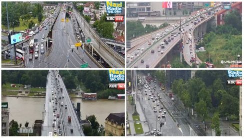 KIŠA STVORILA GUŽVE U BEOGRADU: Usporen saobraćaj na glavim saobraćajnicama (FOTO/VIDEO)