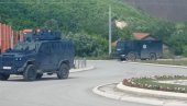 (UŽIVO) KURTI KREIRAO HAOS NA KiM: Naoružani ljudi sa blindiranim vozilom upali u manastir Banjska