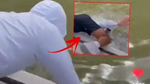 УЗНЕМИРУЈУЋИ СНИМАК: Ајкула зграбила човека из чамца па га повукла са собом у воду (ВИДЕО)