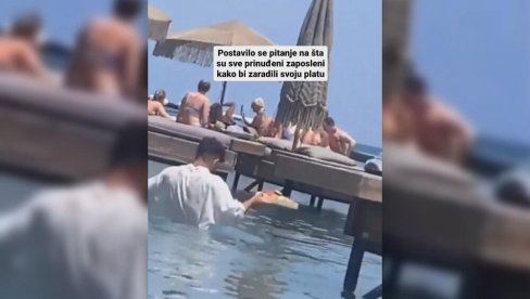 SRAMOTA I UOPŠTE NIJE SMEŠNO! Pogledajte šta mora da radi konobar na plaži u Grčkoj (VIDEO)