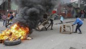 IMA POGINULIH U SUKOBU SA POLICIJOM: Potpuni haos na Haitiju - Pripadnici paravojne formacije ubijeni u razmeni vatre (FOTO)