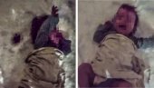UŽASAN SNIMAK: Majka ćerku bacila u sneg, sada joj preti krivično gonjenje (VIDEO)
