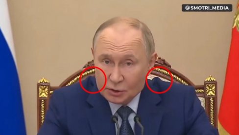 ШТА ЈЕ ТО ПУТИНУ НА РАМЕНИМА? Снимак из Савета безбедности збунио свет - усред говора о нуклеарном наоружању (ВИДЕО)