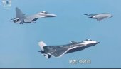 ПРВИ ПУТ ПРИКАЗАН Кинески шамар Западу: Стелт дрон GJ-11 у лету са J-20 и J-16D (ВИДЕО)