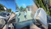 OVAJ VOZAČ IMA DEBELE ŽIVCE! Žena mercedesom napravila haos u maloj ulici (VIDEO)