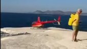 SLETEO HELIKOPTEROM NA PREPUNU PLAŽU, PA UŠAO U MORE: Kada su videli šta radi, nisu mogli da veruju (VIDEO)
