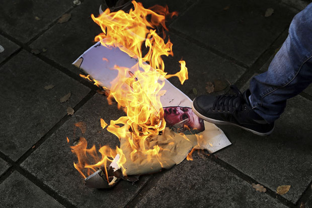 Курди спалили слике Ердогана и Путина у Никозији