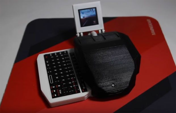 ДЕЛУЈЕ ЧУДНО, АЛИ РАДИ: Цео компјутер спаковао у миша (ВИДЕО)