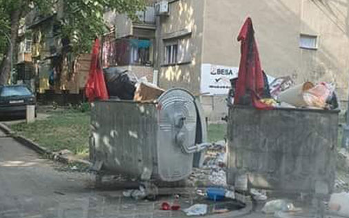 Албанске заставе завршиле у контејнерима (ФОТО)